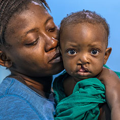 Photo of a mother and son. Link to Life Stage Gift Planner Ages 60-70 Situations.